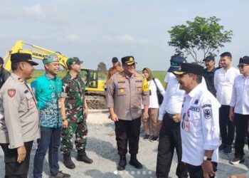 Kapolres Tanah Laut Dampingi Kunjungan Kerja Menteri Pertanian Dalam Rangka Pengembangan Lahan Rawa